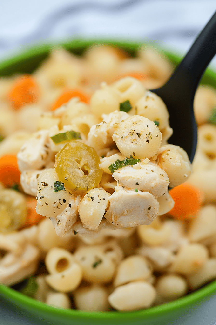 Dill Pickle Chicken Pasta Salad ingredients organized and measured on kitchen counter