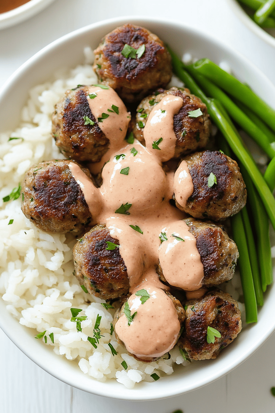 Firecracker Meatballs slice on plate showing perfect texture and swirl pattern