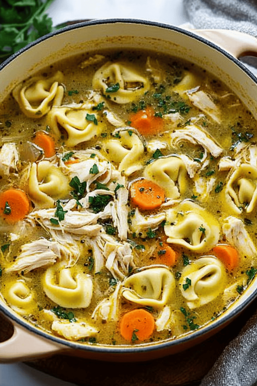 Chicken Tortellini Soup ingredients organized and measured on kitchen counter