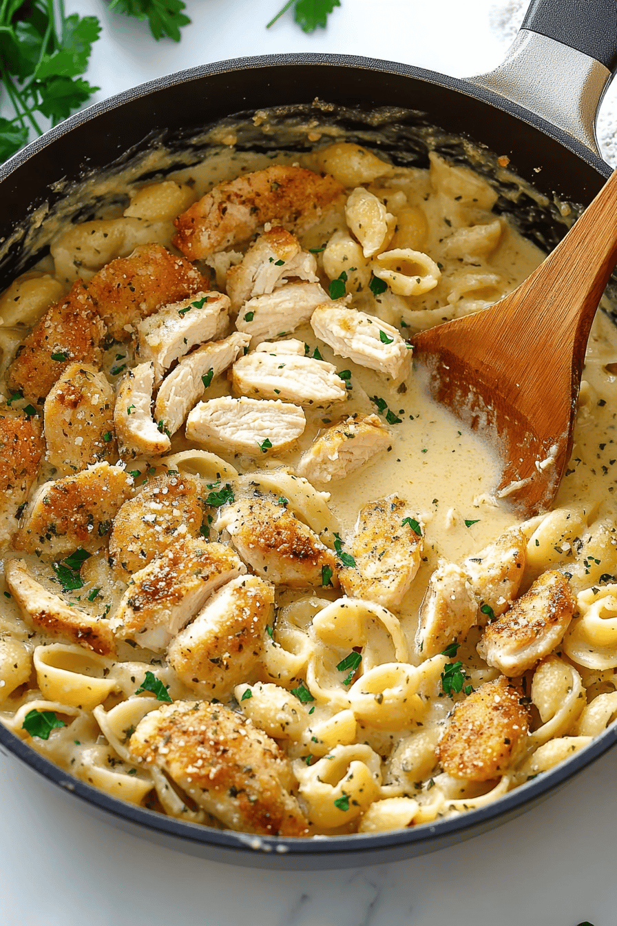 Creamy Chicken Pasta ingredients organized and measured on kitchen counter
