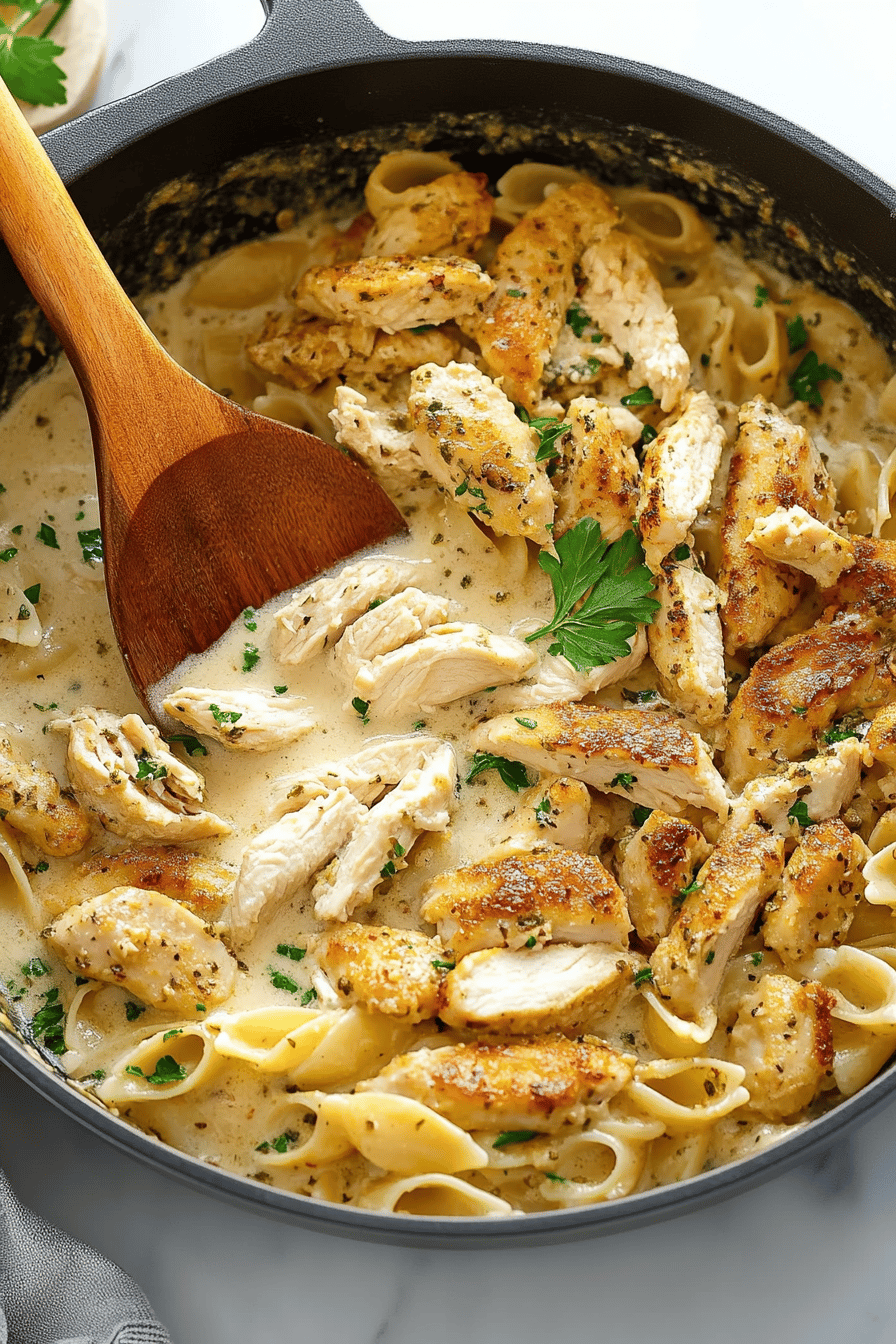 Creamy Chicken Pasta slice on plate showing perfect texture and swirl pattern