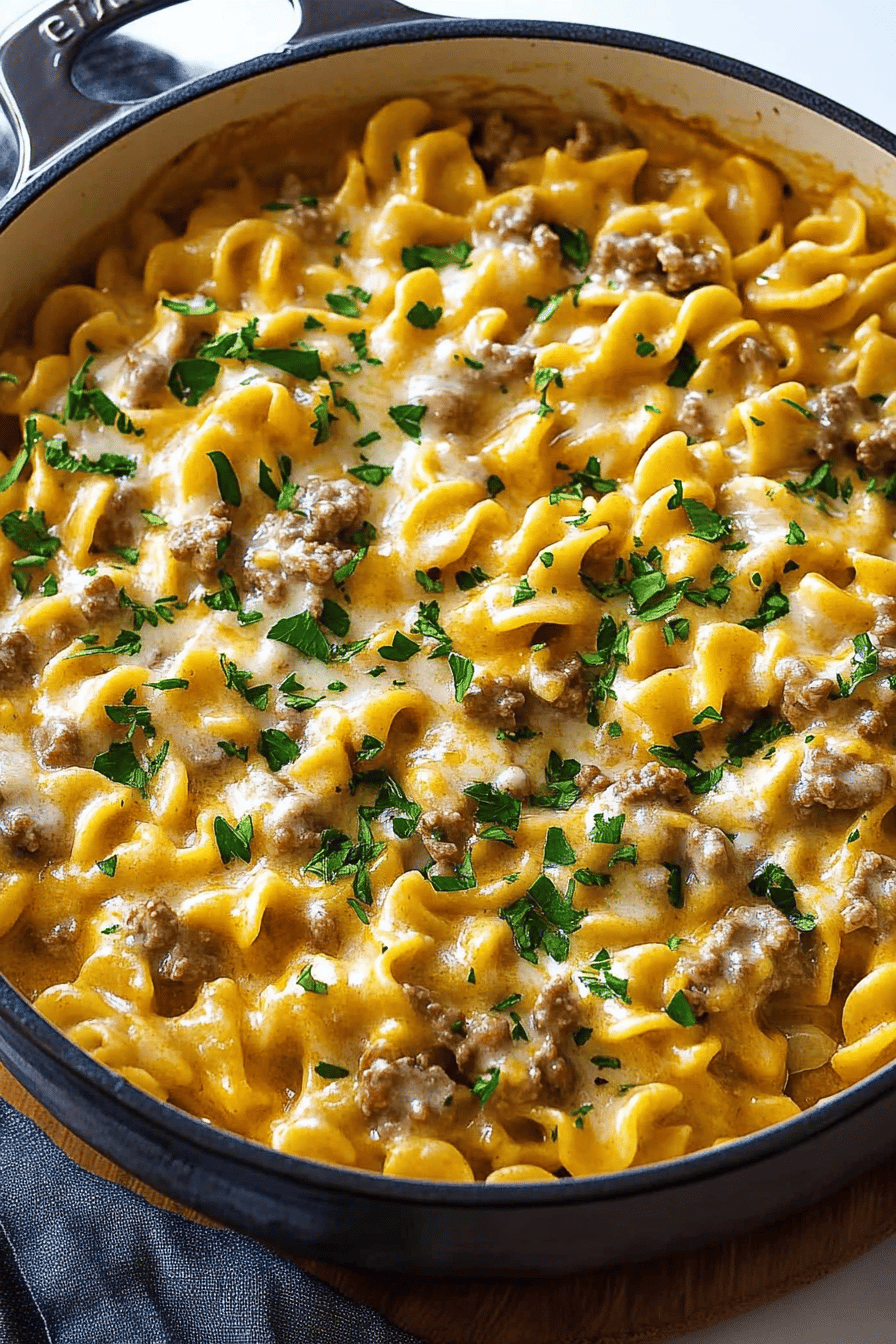Ground Beef Stroganoff Casserole slice on plate showing perfect texture and swirl pattern