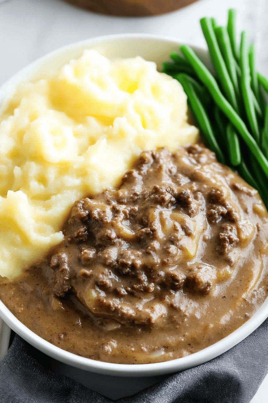 Hamburger Gravy Recipe slice on plate showing perfect texture and swirl pattern