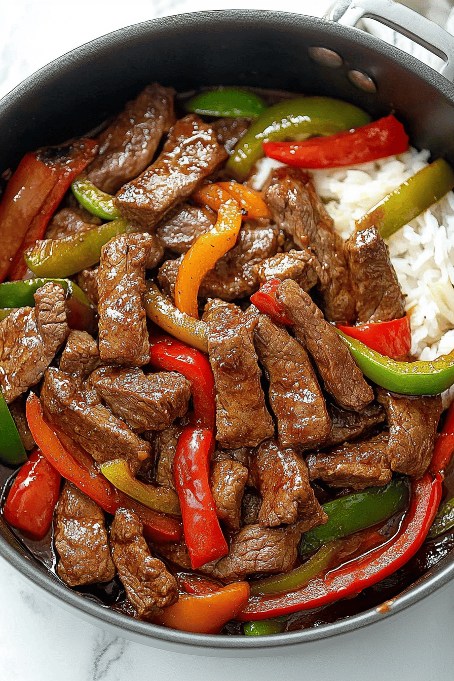 Pepper Steak Recipe slice on plate showing perfect texture and swirl pattern