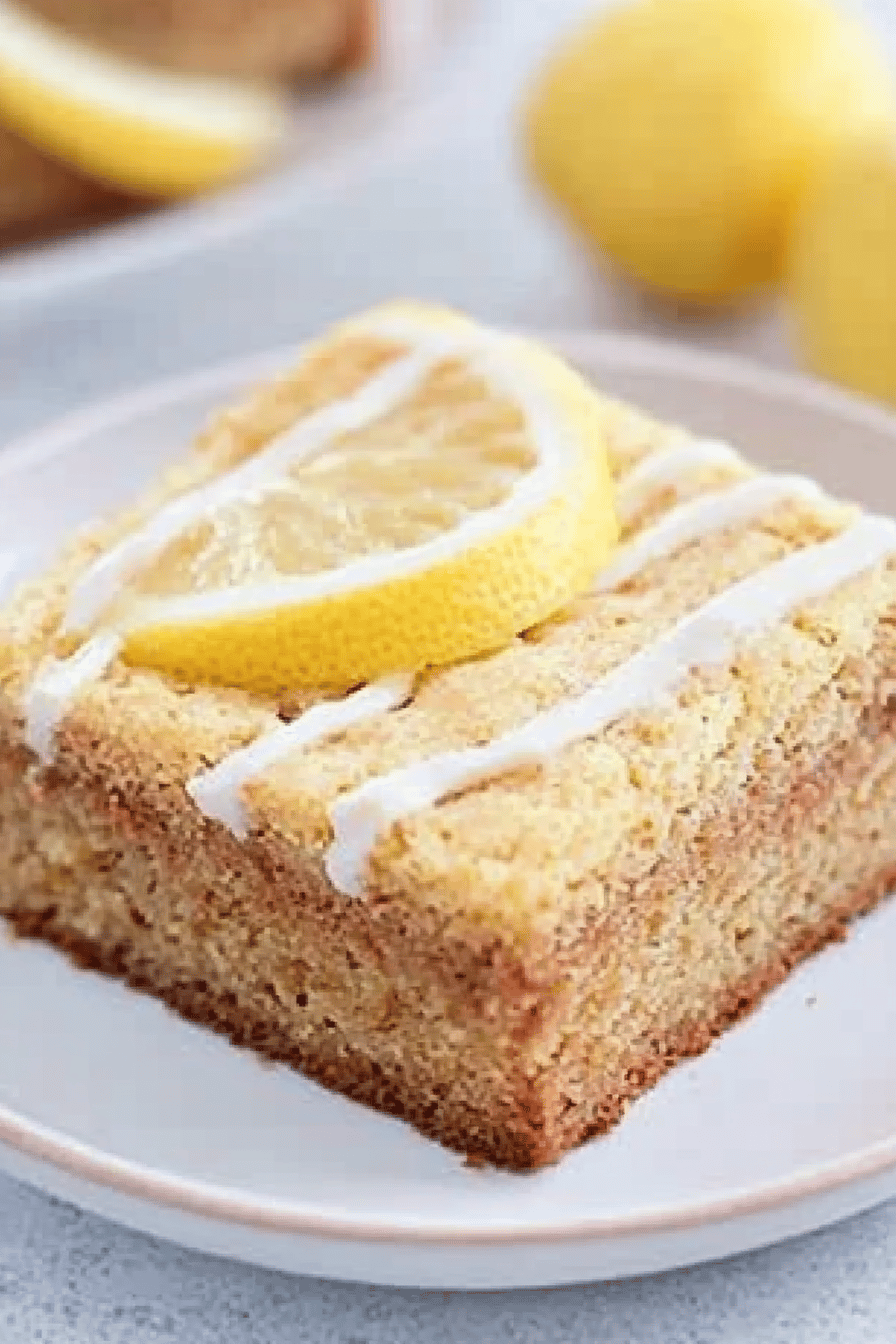 gluten-free lemon brownies slice on plate showing perfect texture and swirl pattern