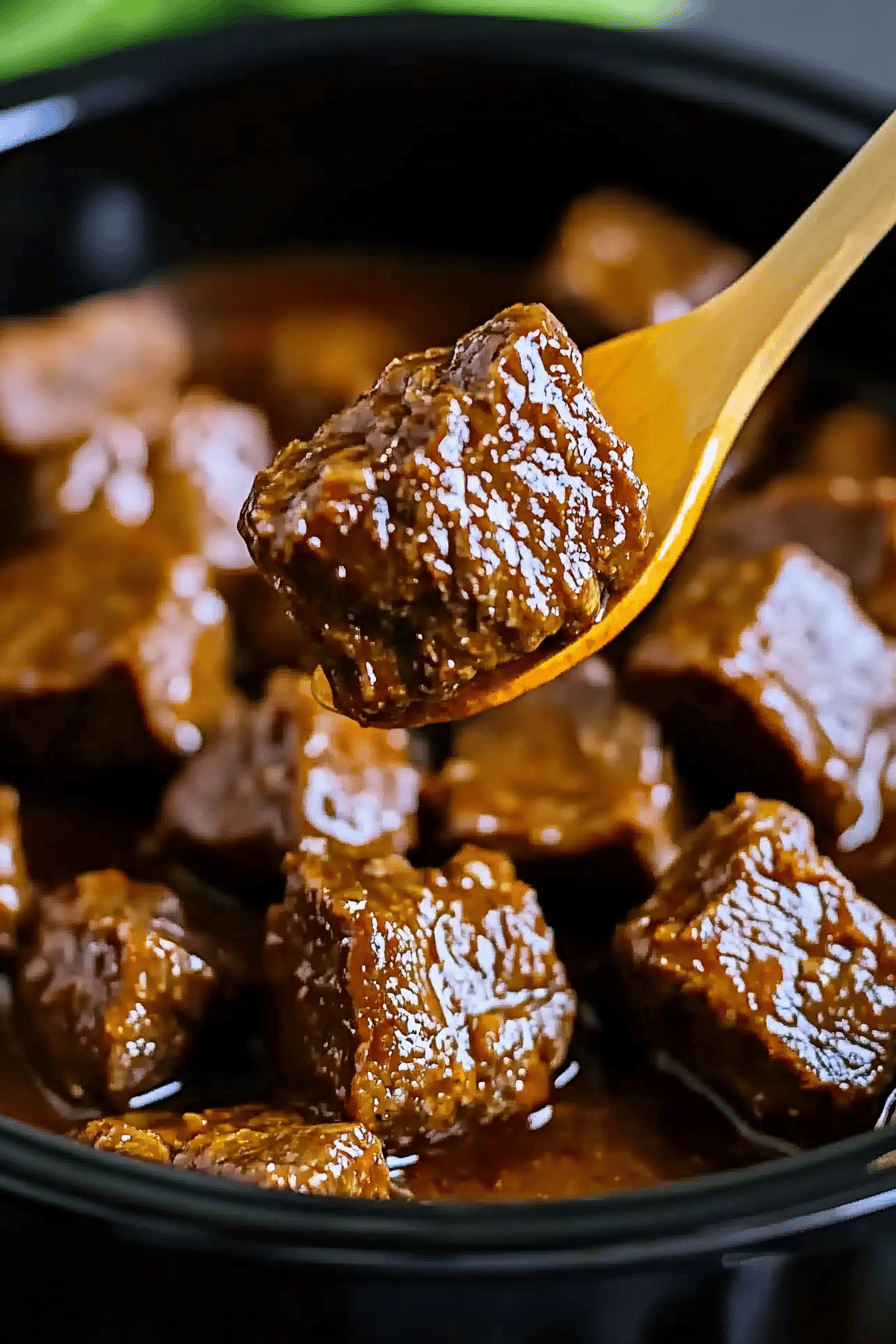Crockpot steak bites slice on plate showing perfect texture and swirl pattern
