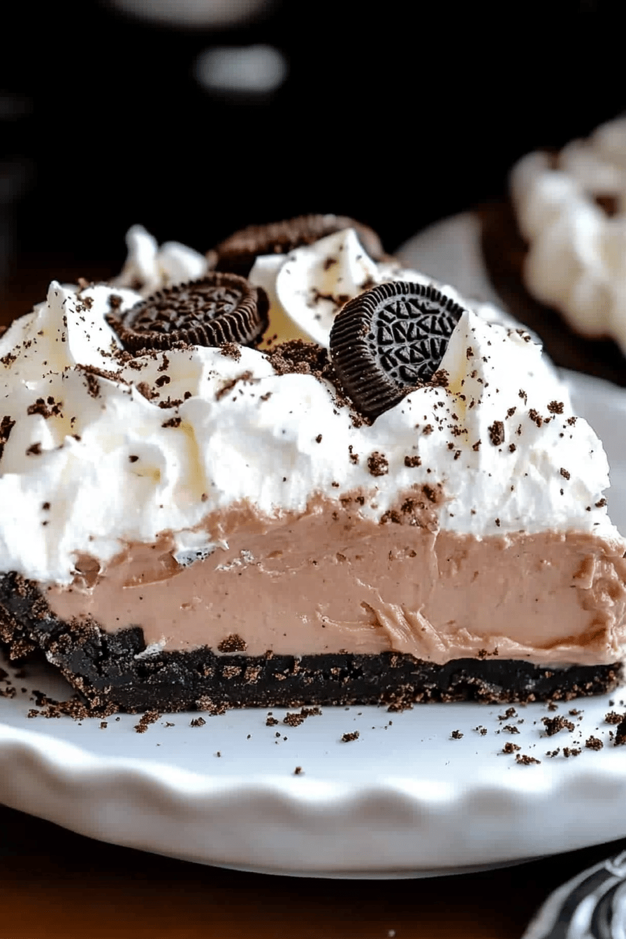 Oreo pie slice on plate showing perfect texture and swirl pattern