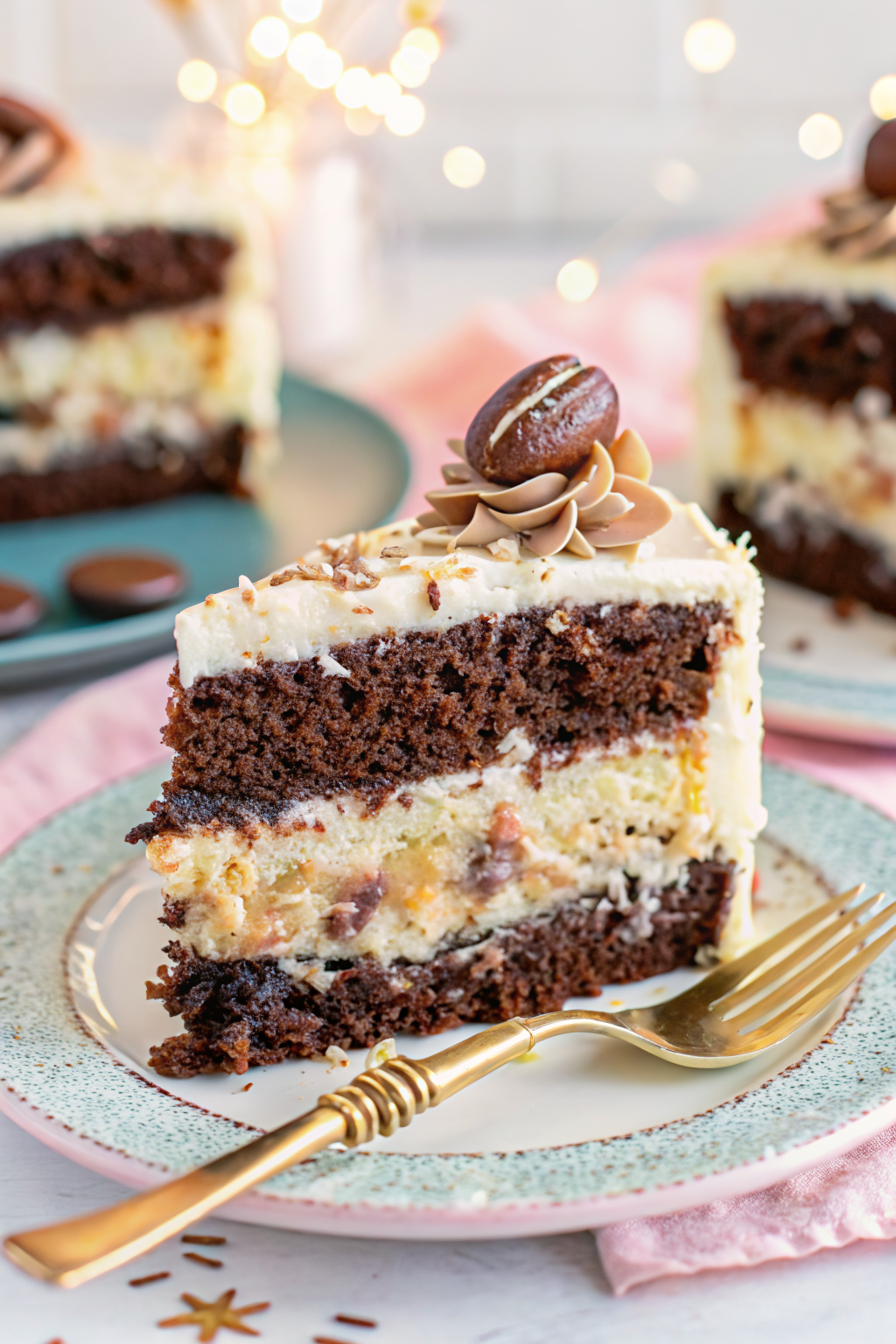 Almond Joy Layer Cake slice on plate showing perfect texture and swirl pattern
