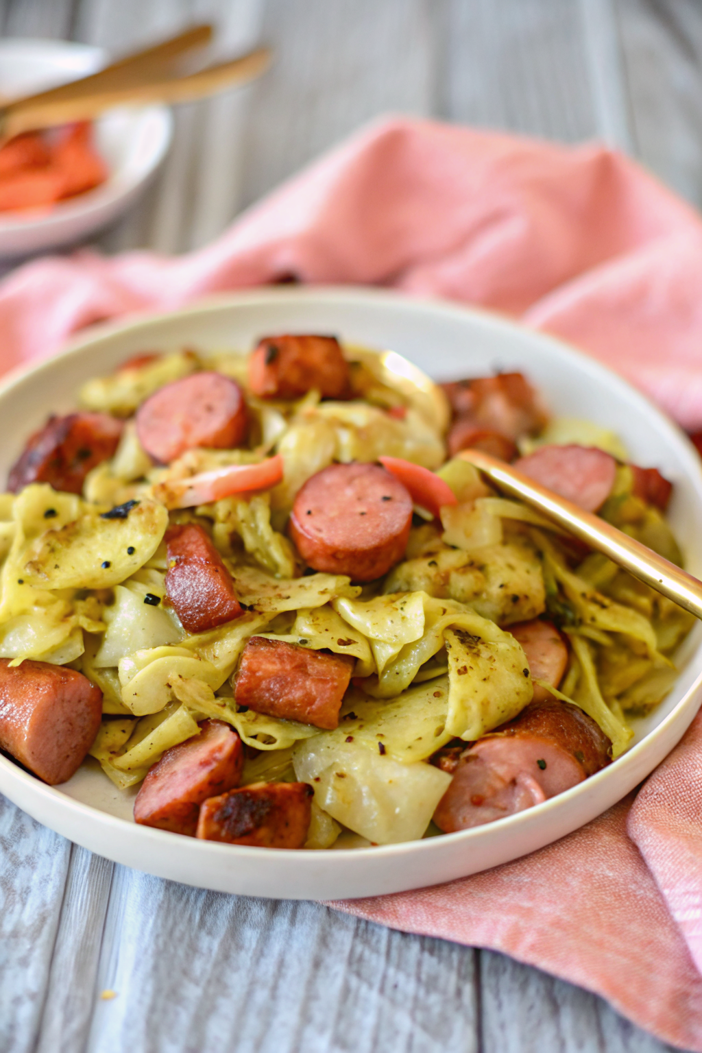 Cabbage Sausage Skillet slice on plate showing perfect texture and swirl pattern