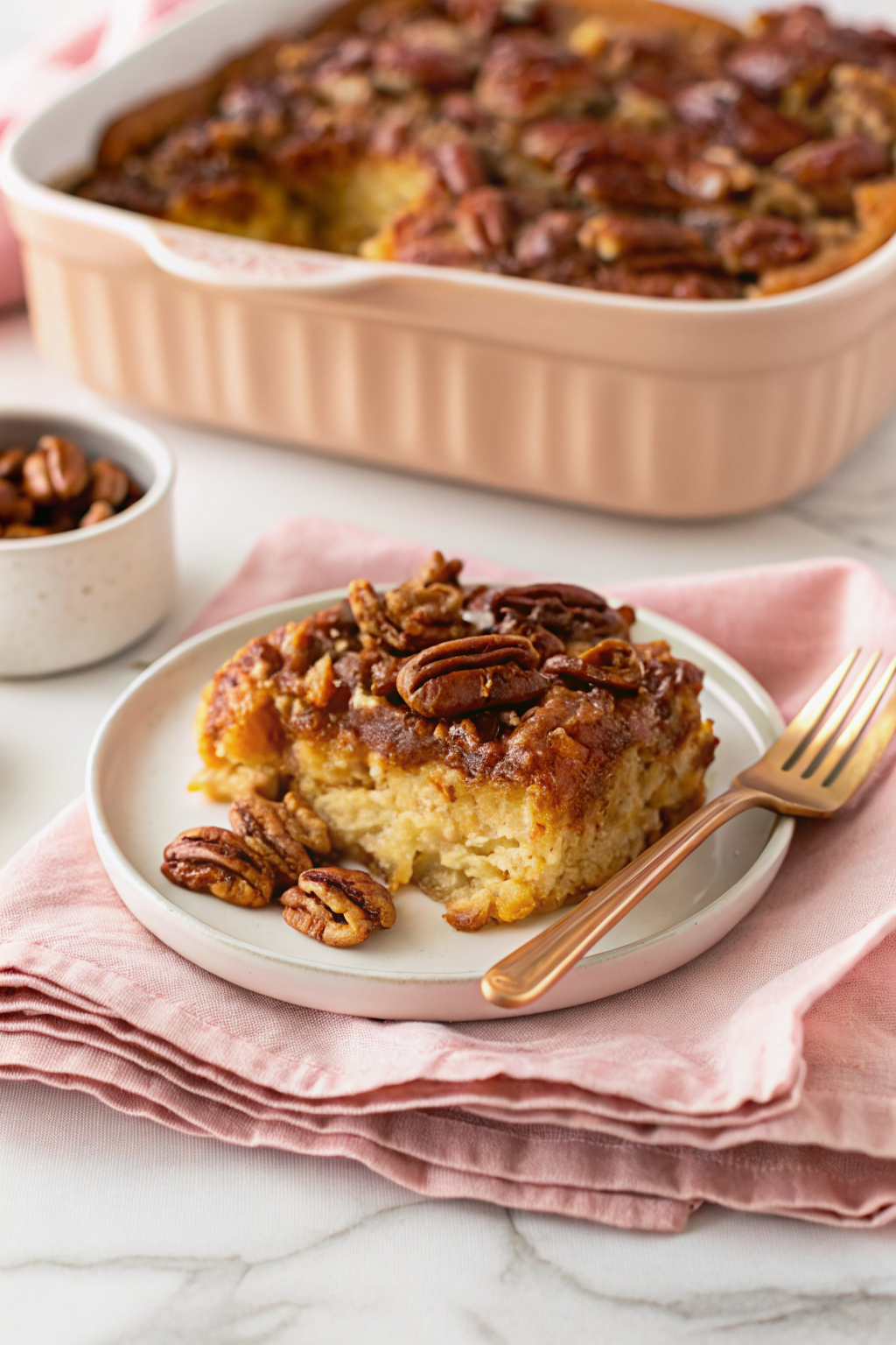 Caramel Pecan Breakfast Casserole slice on plate showing perfect texture and swirl pattern