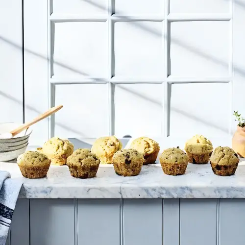 Finished healthy carrot flax muffins in the reserved kitchen scene