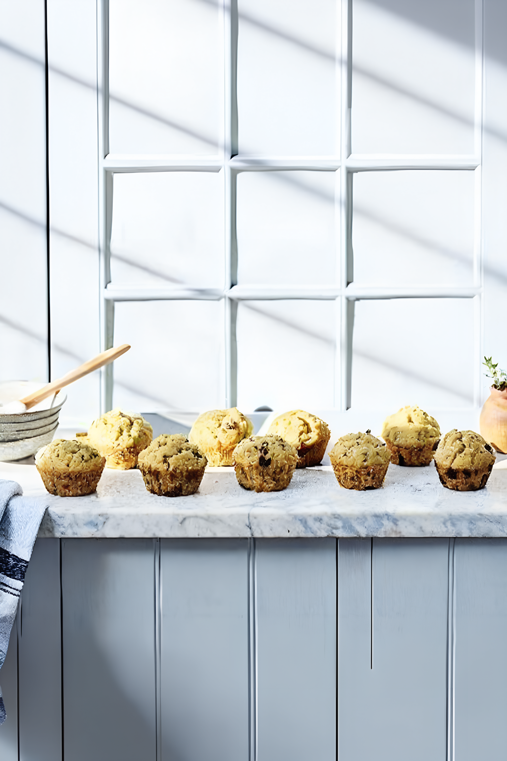 Finished healthy carrot flax muffins in the reserved kitchen scene